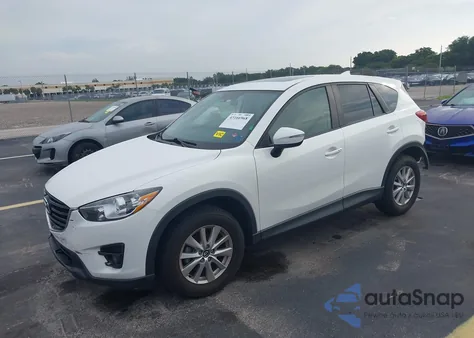 2016 Mazda Cx-5 Touring z USA, uszkodzony, nr VIN JM3KE2CY7G0858705